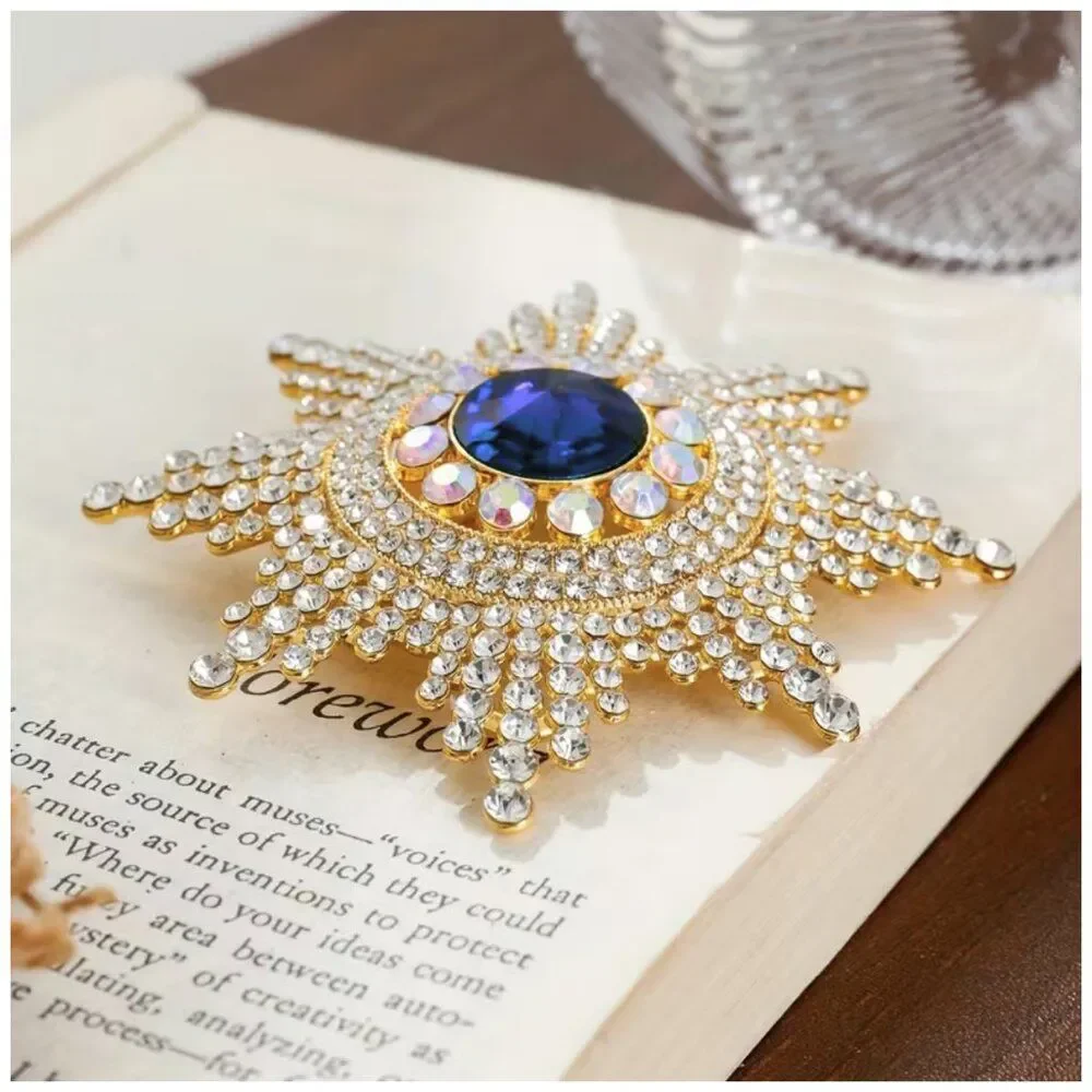 Regal Radiance Starburst Brooch Sapphire Blue Center Vintage Rhinestone Elegance